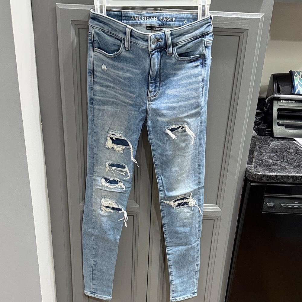 American Eagle Outfitters Women's Light Blue Ripped Skinny Jeans - Size 0